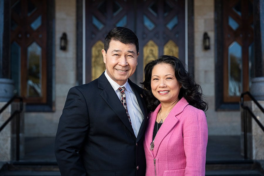 Theresa and Thang Nguyen stand together